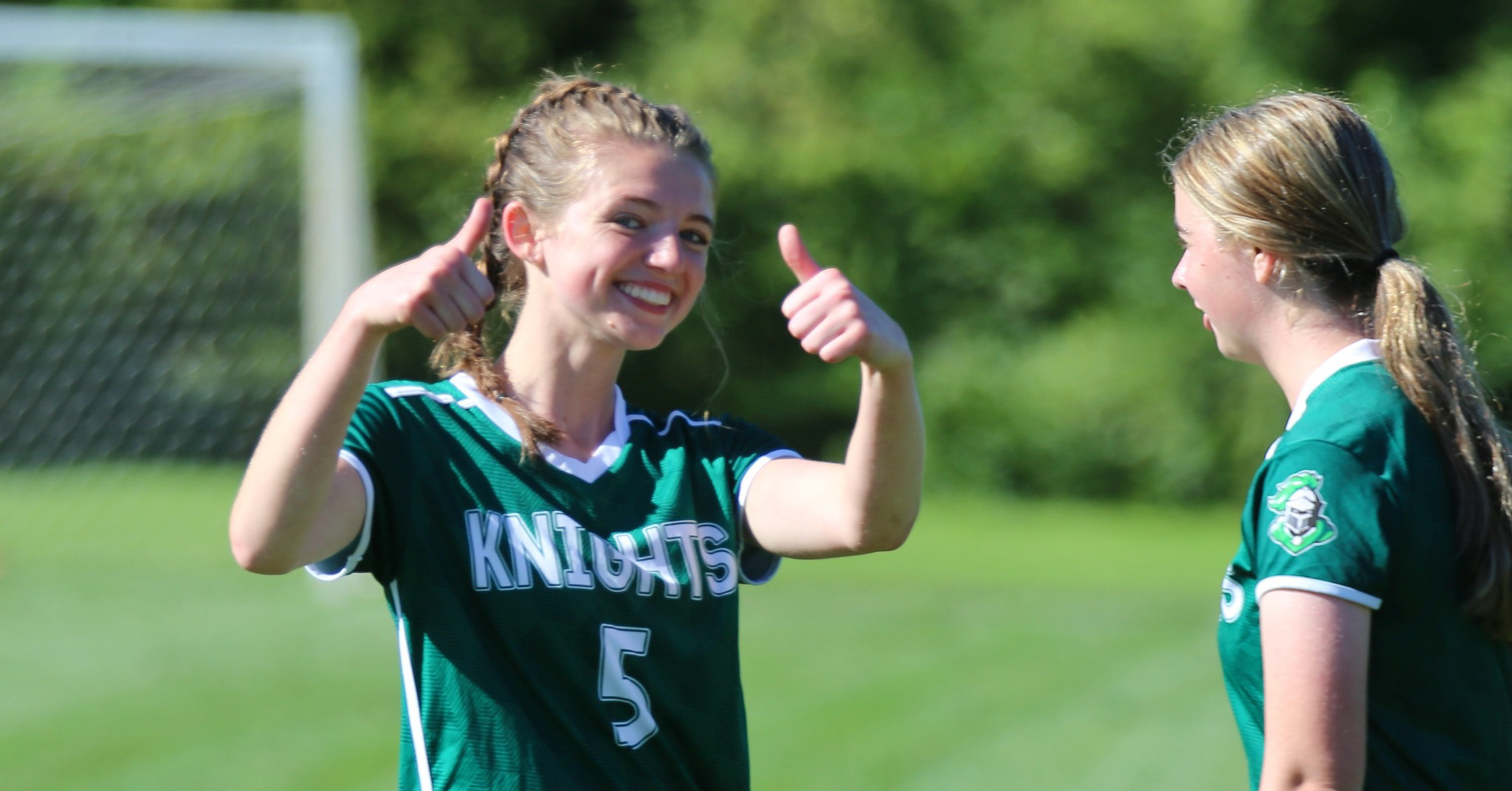Soccer player gives thumbs-up