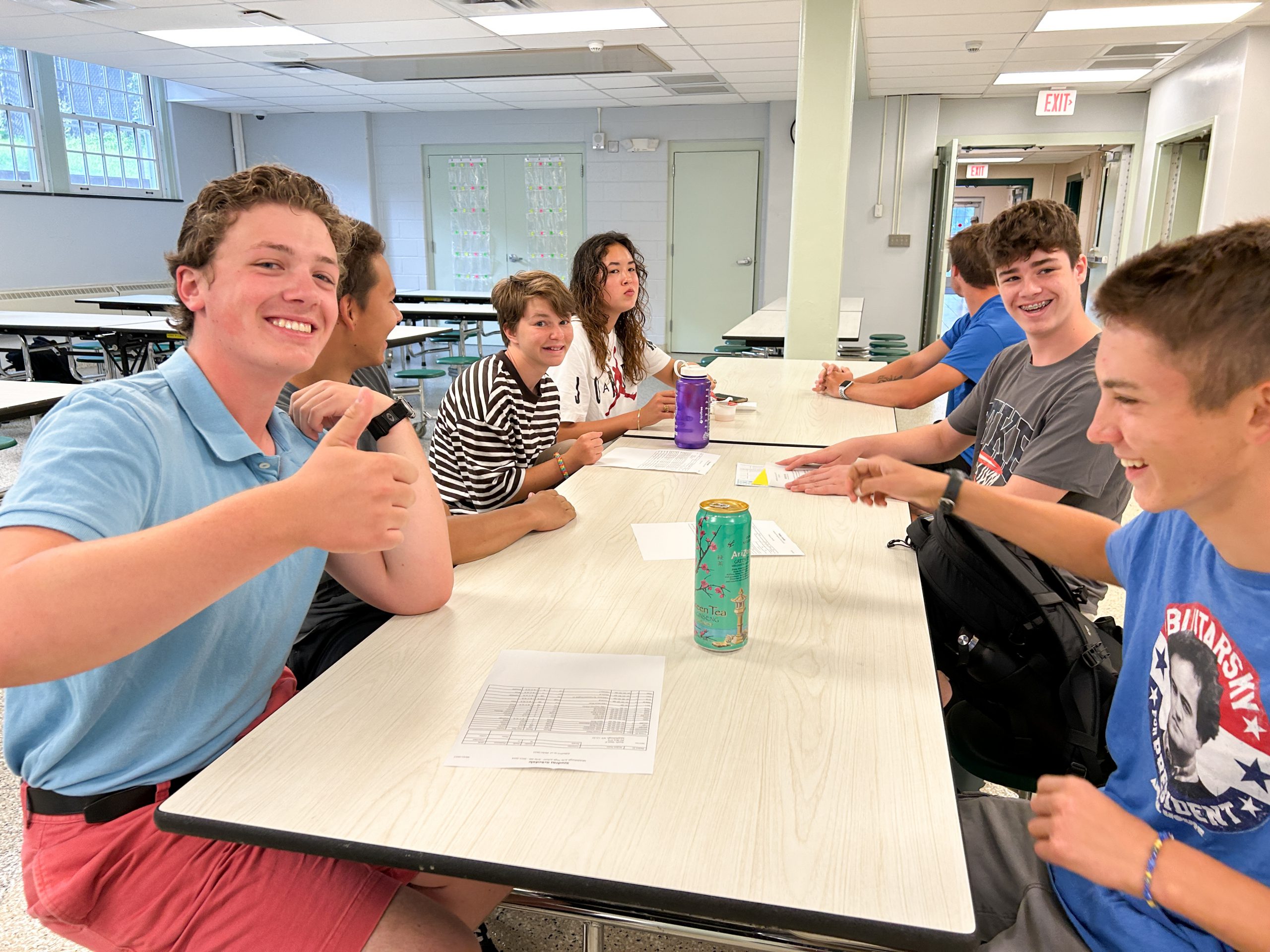 High school students at cafeteria table.