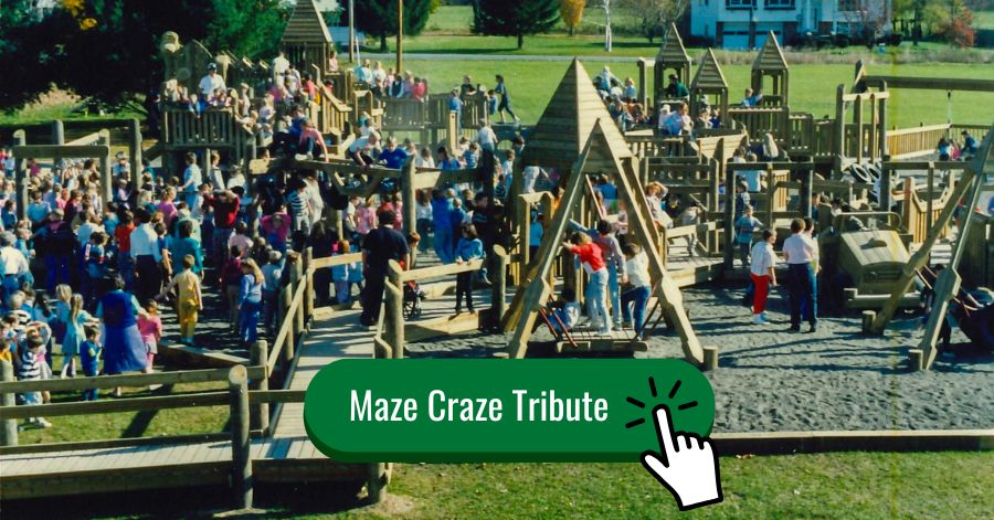 Dozens of community members stand on the site of the newly constructed Maze Craze.