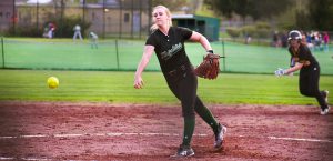 a middleburgh player pitches a ball during a softball game