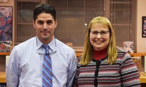 brian dunn and board of education president Pamela Standhart pose for a picture