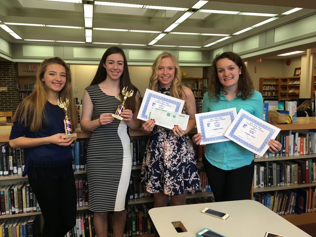 fbla students pose with their awards