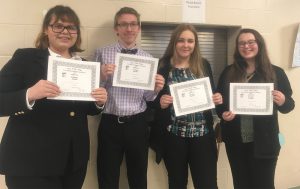 middleburgh fbla students pose with their awards
