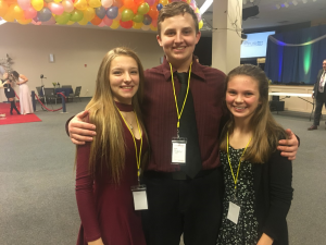 Vivian Hanley, Andrew Miaski, and Andie Burton pose for a picture