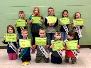 mes students pose with their courage awards