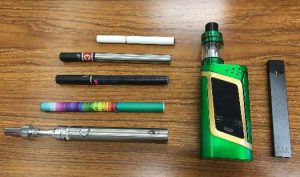 various types of e-cigarettes on a table