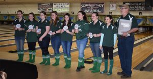 middleburgh girls varsity bowling team poses with their sectional patches and plaque