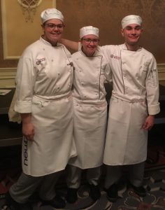 Logan Stephens poses with Alexia Torres and Katelyn Manchester of the Capital Region BOCES culinary team