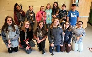 mes students pose with their instruments at nyssma