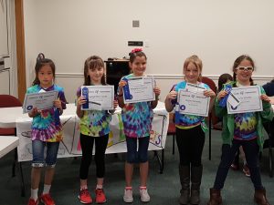 winning battle of the books team poses for a picture