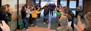 bus drivers are greeted by elementary students