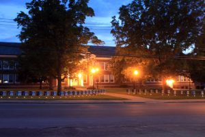 school lit up at night