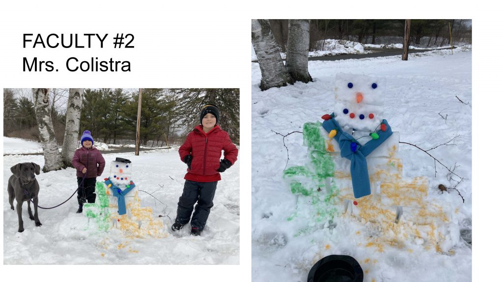 square and rectangle shaped snowman with colorful lights around the blue scarf, black hat, blue round eyes, and a mix of red and blue round pieces for the mouth. Part of the snowman's body is colored with yellow dye and the other side is green. Two young kids and a black dog are next to the snowman.