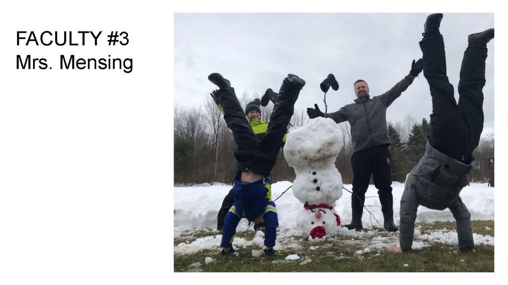 Upside down snowman with stick arms on ground like its doing a handstand. A parent and young kid are behind the snowman with their arms out, and two other people are doing headstands off to either side of the snowman