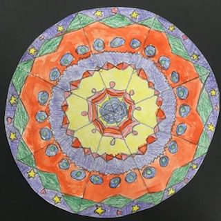 Tibetan Mandala in purple, green, yellow, orange, yelow and red patterns and circles