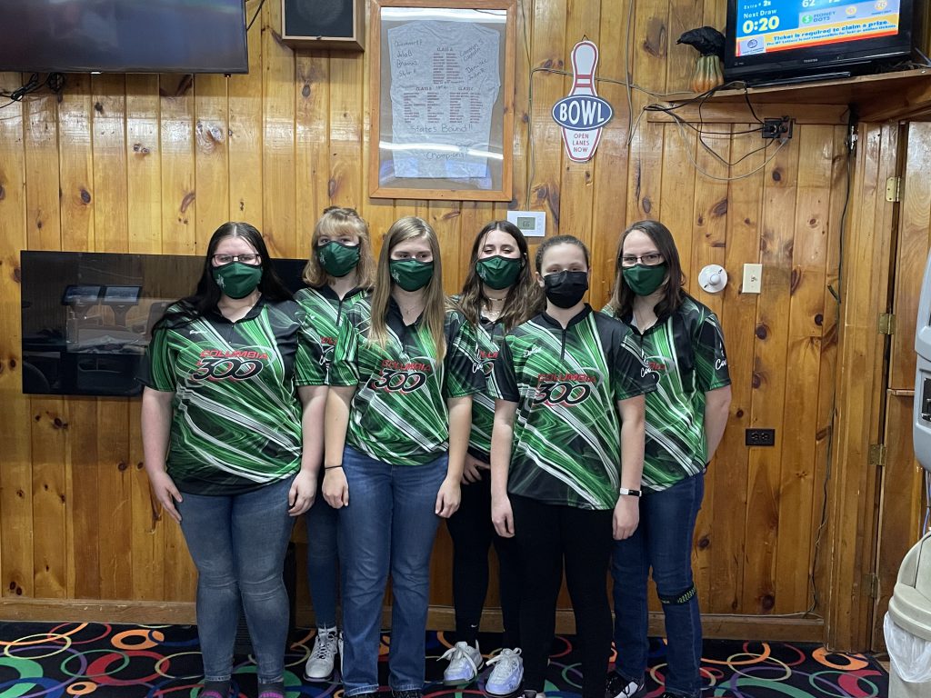 Six members of Middleburgh bowling team in their new jerseys standing side by side