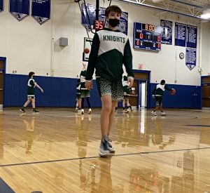 basketball player walking off court