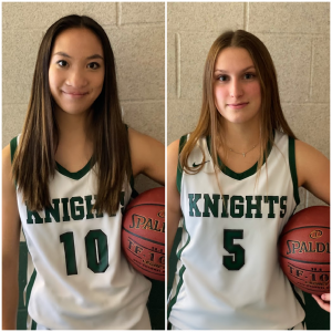 two students in basketball uniforms holding a basketball