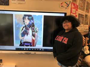 woman stands next to her animation on a smartboard
