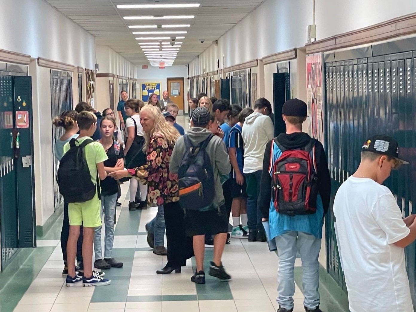 Students visit Junior and Senior High Students visiting their lockers between classes
