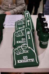 Green Middleburgh foam fingers and water bottles to be sold for Scho-Burgh basketball games