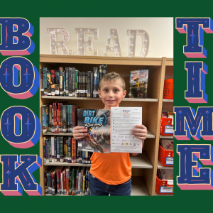 Boy stands in library holding a book and registration sheet.  He is smiling. The words book time and read surround him.