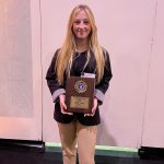 Sarah Schafroth holding state FBLA award