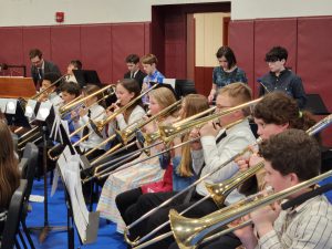 Students playing brass instruments.