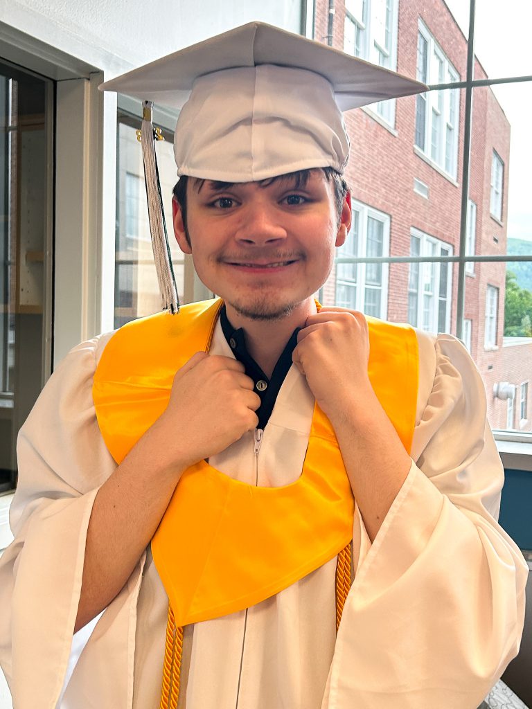 One student in cap and gown