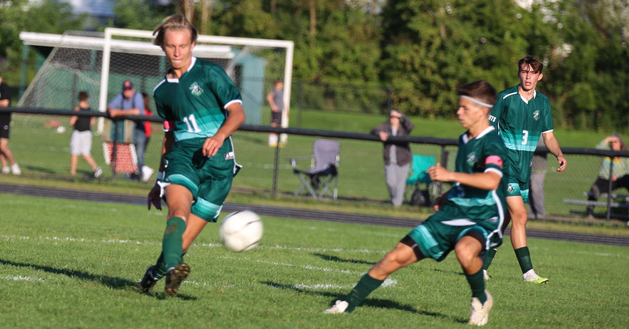 Members of the Middleburgh Varsity Soccer Team in action