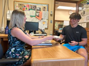 Senior Ben Croote meets with Heather Pond from SUNY Brockport