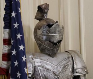 American flag next to Knight's armor