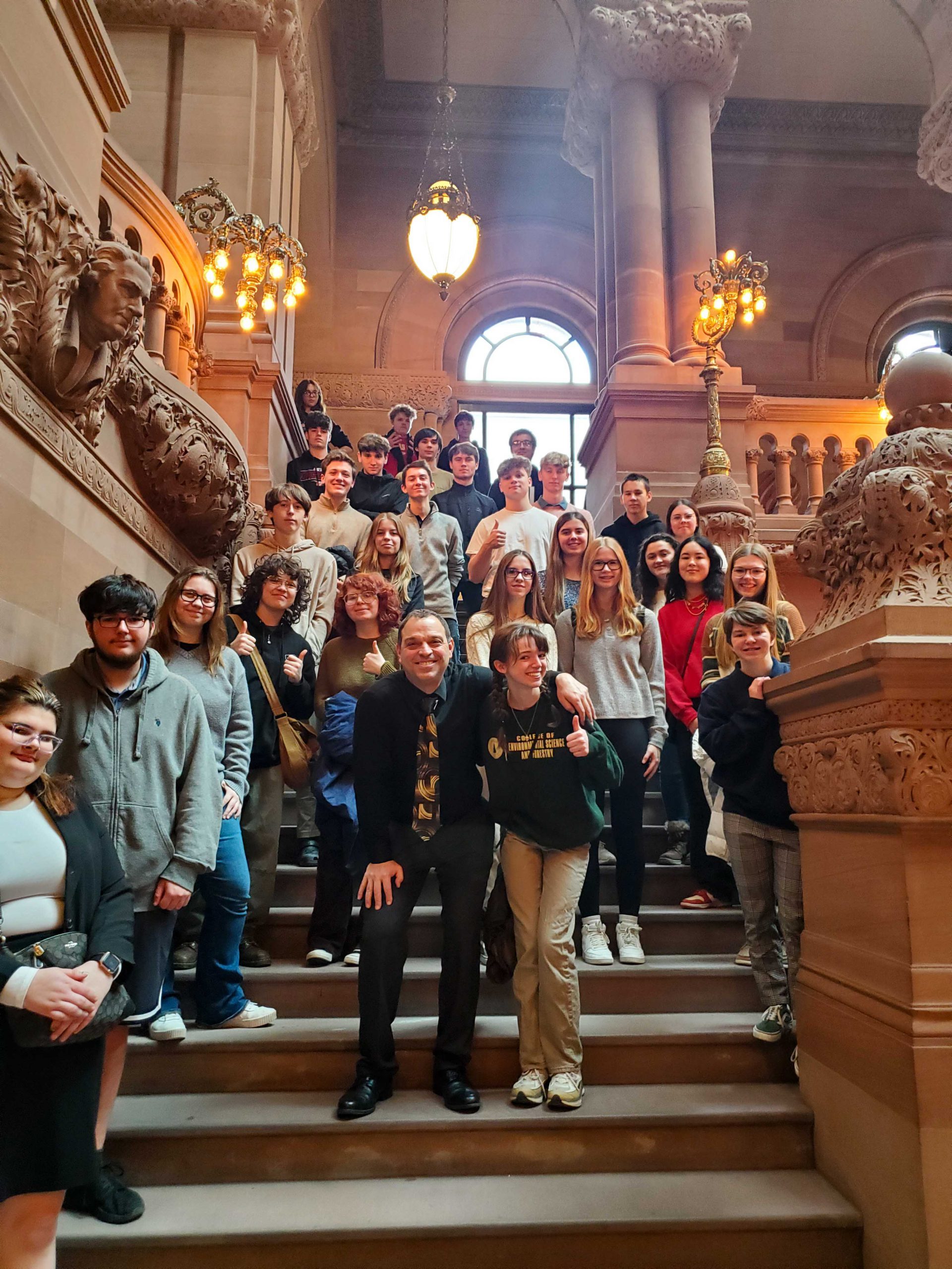 Students on the steps of the Million Dollar Staircase