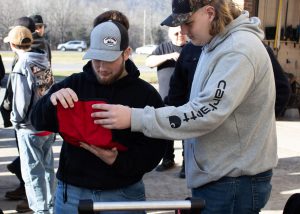 Two students examine a new tool.