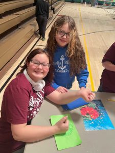 Students work on art project.