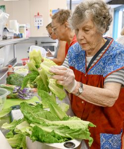 Women preparing food.