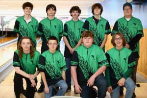 Boys bowling team in group.
