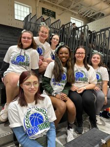 Cheerleaders wearing Scho-burgh shirts.
