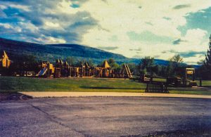 Maze Craze playground with mountains and clouds in the distance.
