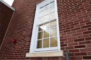 Window with cardboard behind it.