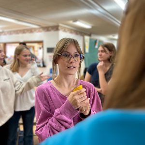 Teens participate in discussion groups.