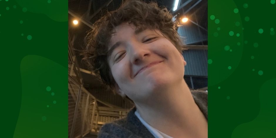 Close-up of a teen smiling.