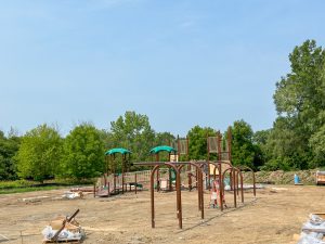 New playground equipment under construction.