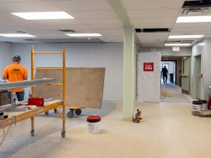 Demolition work inside a bathroom renovation area.