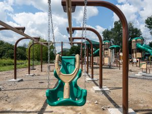 Playground swing area under construction.