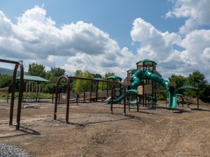 Accessible playground equipment under construction.