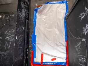 Interior window replacement area under construction.